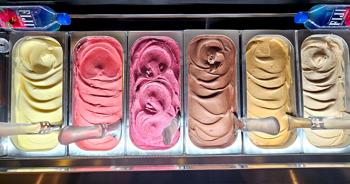 looking down on 6 pans of gelato