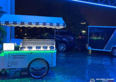 Vintage Gelato Cart at night in the dark with truck and trailer parked behind