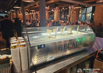 View from behind a Gelato Tabletop looking at a room full of guests