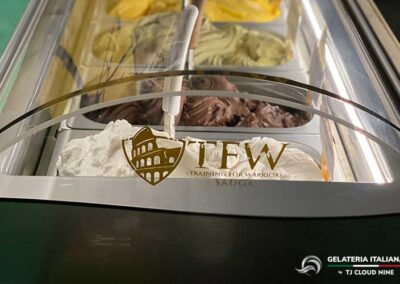 close up of TFW logo on the side of a gelato tabletop